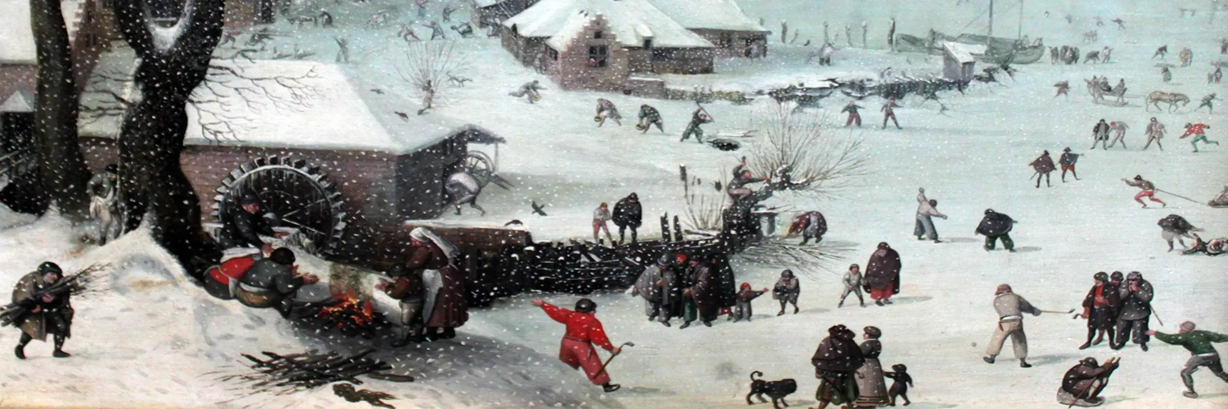 Schneelandschaft mit spielenden Menschen