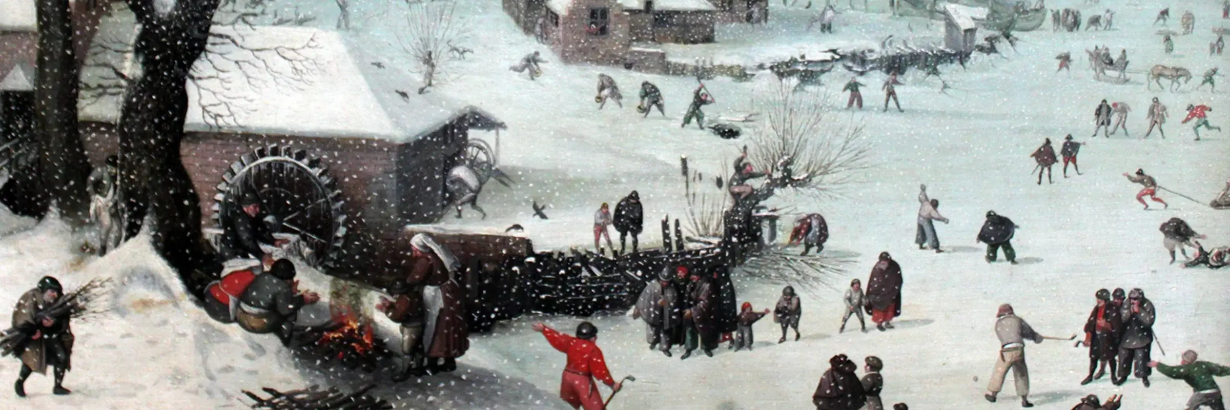 Schneelandschaft mit spielenden Menschen